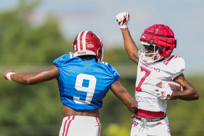 D.J. Matthews celebrates with Michael Penix Jr. during Indiana's fall camp on Aug. 20.